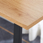 Close-up view of the surface of the 150cm office desk workstation showcasing the wooden finish and sleek design.