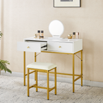 White vanity table with open drawer, round mirror and gold stool