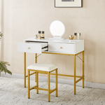 White vanity table with open drawer, round mirror and gold stool