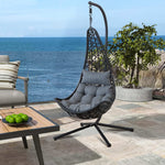 Hammock swing chair F95 with gray cushions on a patio with ocean view | Artisansa SA