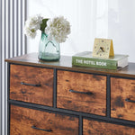 Storage cabinet 9 drawers OT-117 with vase of flowers, clock, and book on top against white curtain background | Artisansa SA
