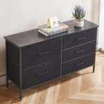 Black dresser with three drawers on a wooden floor | Artisansa SA
