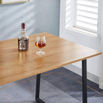 150cm office desk workstation featuring a wooden surface with a glass of beverage and a bottle.