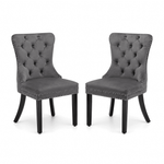 Dining Chairs Set of 2 tufted velvet button-back chairs with nailhead trim in dark color.