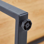 Close-up of corner joint of a 150cm office desk workstation showing durable construction and adjustable feet.