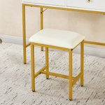 Cream cushioned stool with gold metal frame for dressing table