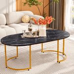 120cm oval coffee table with styled decorative accessories