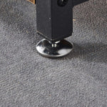 Close-up of the adjustable foot of a Kitchen Baker's Rack, providing stability on various surfaces.