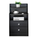 White Bedside Table with Drawers showcasing modern design, two drawers, and decorative top shelf with plant and coffee.