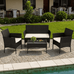 Patio Furniture Set 4 Piece PE Rattan with cushions and glass table in a stylish outdoor setting.