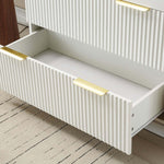 Bedroom Wardrobe drawer with fluted design and elegant gold handles for functional storage.