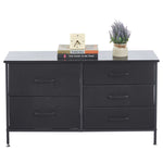 5-drawer storage cabinet TV stand in black with decorative items on top