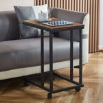 Side End Table Coffee Table Bedside Table OT-115 with C-shaped design and rolling casters, placed beside a sofa.