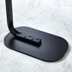 Close-up view of the base of the Modern Two-Tone End Table OT-106 showing sleek black finish and minimalist design.