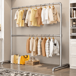 Double pole clothing rail drying rack displaying neatly hung clothes in a stylish indoor setting.