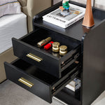 Black bedside table with both storage drawers open