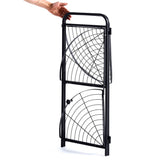 Black metal gate with a hand holding it open on a white background | Artisansa SA