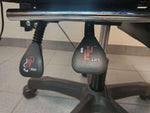Close-up of the adjustment levers on an LED Light Gaming Chair for height and lock features.