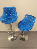 Velvet Blue Bar Chairs set of 2 with chrome bases, showing tufted velvet fabric and elegant design.
