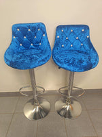 Velvet Blue Bar Chairs set of 2 showcasing stylish design and elegance for kitchen or entertainment area.