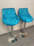 Velvet Bar Chairs set of 2 in vibrant blue with stylish button tufting and chrome bases, perfect for modern interiors.