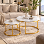Close-up of white marble-look tabletop and gold metal frame details