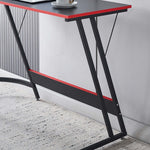 Close-up of L-Shaped Desk with Monitor Shelf featuring black frame and red accent, suitable for modern work setups.