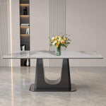 Rectangular marble dining table Q-03 with white marble top and black U style leg, decorated with flowers.