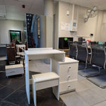 Alternative angle of a White Dressing Table with Mirror and matching stool in a contemporary indoor display space