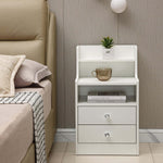 White Bedside Table with Drawers showcasing elegant nightstand design in a modern bedroom setting.