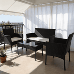 Patio Furniture Set 4 Piece PE Rattan with Cushions & Glass Table in a sunny outdoor setting