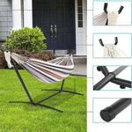 Double Hammock with Steel Stand displayed outdoors on a sunny day, showcasing vibrant stripes and sturdy support.