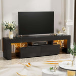 Angled black TV unit with two drawers and warm LED-lit side shelves