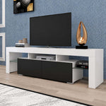 Angled view of white and black TV stand with two drawers and open media storage