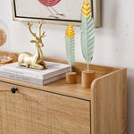 Rattan Flip-Top Shoe Cabinet showing a stylish top surface decorated with a gold deer figurine and decorative leaves.