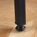 Close-up of the sturdy leg design of the 5-Tier Industrial Shoe Rack on a wooden floor.