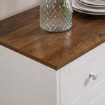 Farmhouse Sideboard Storage cabinet top detail with rustic brown wood finish and decorative glass jar.
