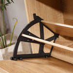 Rattan Flip-Top Shoe Cabinet assembly tool close-up with wooden slats and a plant in the background.