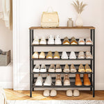 Front view of an industrial shoe rack storing trainers, heels and ankle boots beneath a rustic wood look top