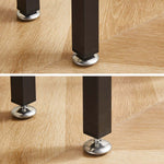 Close-up of adjustable feet on a narrow sofa table with charging station for stable support on hardwood flooring.