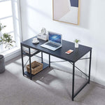 Black study desk with laptop, side shelves and storage basket beside a bright window