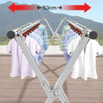 Foldable Clothes Rail showcasing stainless steel X-frame design with shirts displayed; compact 53cm width.