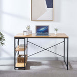 Light wood study desk with laptop and reversible storage shelves in a compact workspace