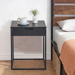 bedside table drawer detail showing compact bedroom storage solution