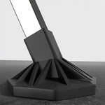 Close-up of the base of a Foldable Clothes Rail, featuring a sturdy black design for stability.