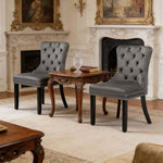 Dining Chairs Set of 2 tufted velvet chairs with button-back design and nailhead trim in elegant interior setting.