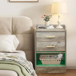 Modern LED Pedestal with Open Shelf - Set of 2 displayed in a bedroom with a lamp and decorative items.