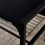 Close-up view of dining table set with bench, featuring black metal frame and storage racks.
