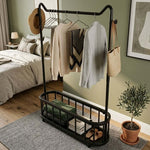 Freestanding Clothes Rack with hanging clothes, open bottom shelf, and lockable wheels in a stylish bedroom.
