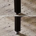 Close-up view of adjustable feet on dining table set with bench, designed for stability on uneven surfaces.